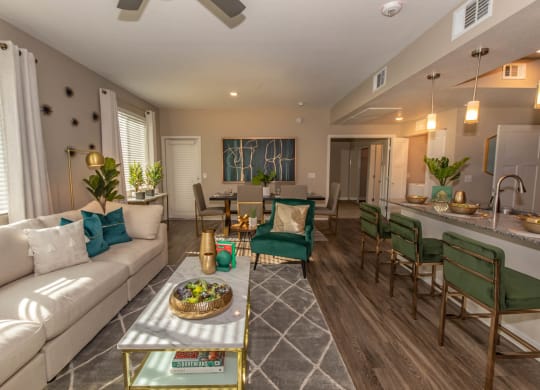 Living room with couch and cushions and center table at Level 25 at Cactus by Picerne, Nevada