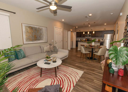 Living room with ceiling  fan at Level 25 at Cactus by Picerne, Las Vegas, NV