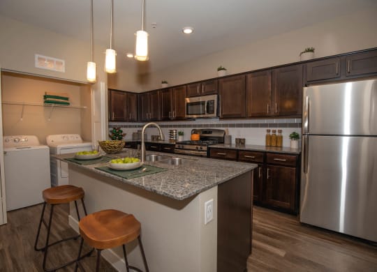 Kitchen with cabinets at Level 25 at Cactus by Picerne, Las Vegas, NV