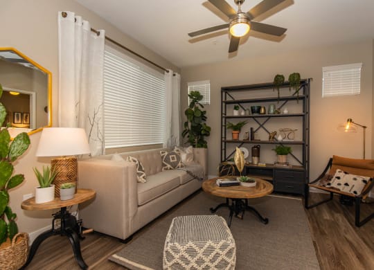 Living room with couch and center table1 at Level 25 at Cactus by Picerne, Nevada