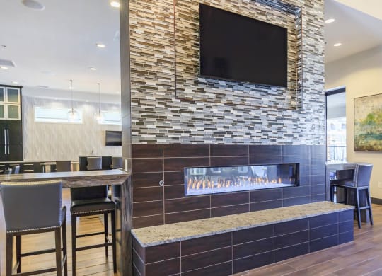 Tv with fireplace at Level 25 at Durango by Picerne, Las Vegas