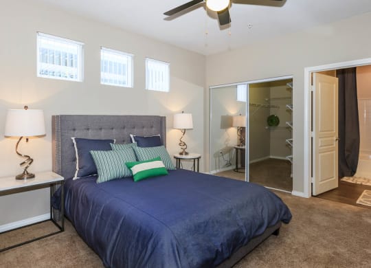 Bedroom with bed and lamps at Level 25 at Durango by Picerne, Las Vegas, NV, 89113
