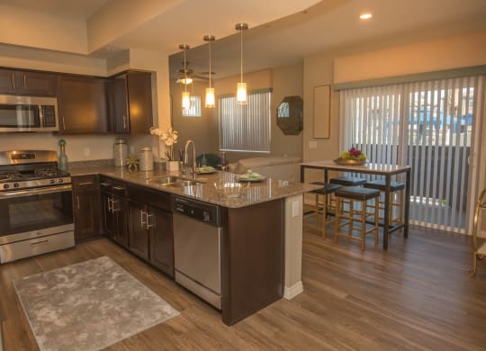 Kitchen with cabinets at Level 25 at Oquendo by Picerne, Nevada
