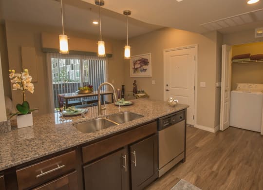 Yellow lights in kitchen at Level 25 at Oquendo by Picerne, Las Vegas