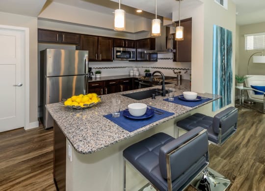 Dining table decor and kitchen at Level 25 at Sunset by Picerne, Las Vegas