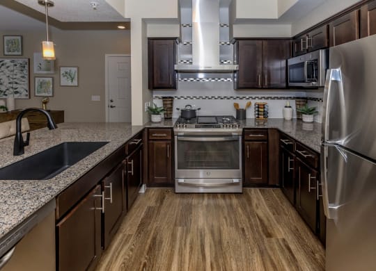 kitchen with appliances at Level 25 at Sunset by Picerne, Las Vegas
