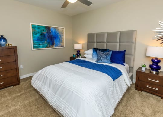 Bedroom with lamps and frames at Level 25 at Sunset by Picerne, Las Vegas, 89113