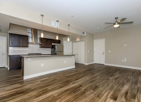 Wooden flooring living room and kitchen at Level 25 at Sunset by Picerne, Las Vegas, 89113