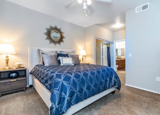 Bedroom with lights and bed at The Paseo by Picerne, Goodyear