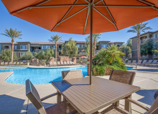 Poolside Dining Table at The Passage Apartments by Picerne, Henderson, NV