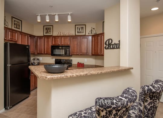 Spacious Kitchen With Pantry Cabinet at The Passage Apartments by Picerne, Henderson, Nevada