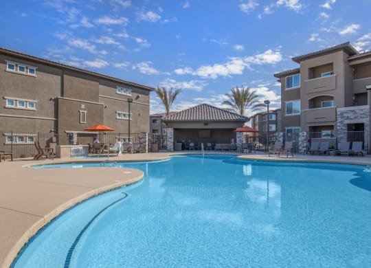 Pristine swimming pool at The Passage Apartments by Picerne, Henderson, NV, 89014
