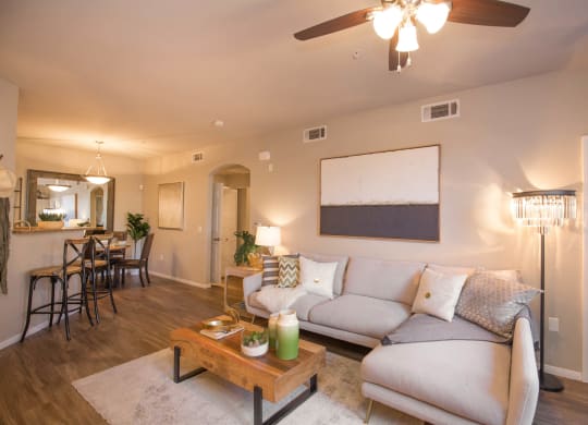 Living Room With Kitchen View at The Pavilions by Picerne, Las Vegas, 89166