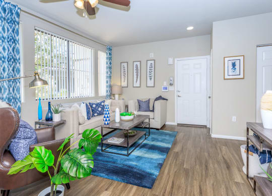 Living Room With Ceiling Fan at The Presidio by Picerne, Nevada, 89084