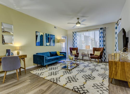 Living room with tv and couch at The View at Horizon Ridge, Henderson, Nevada
