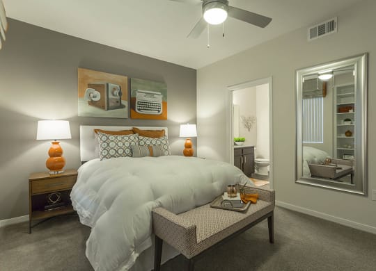 Bedroom decor with lamps with ceiling fan at The View at Horizon Ridge, Henderson, Nevada