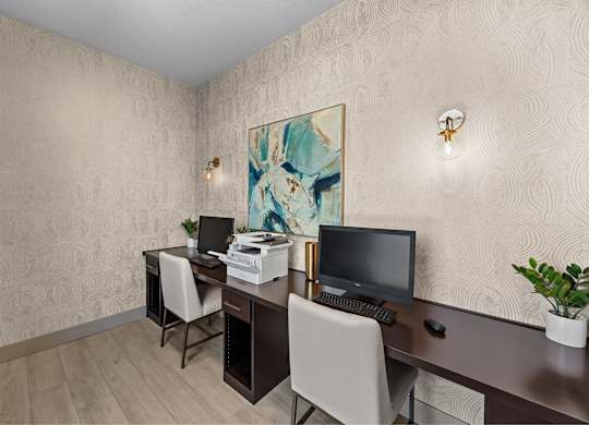 Community business center with computers and a printer at The Fairways by Picerne Apartments, Las Vegas, NV