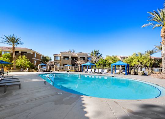Swimming pool with cabana and seating
