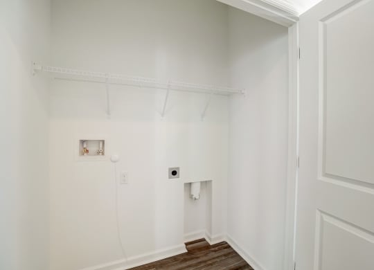 Elm floor plan laundry room with full size washer and dryer connection at Beacon at Clinton Corners in Dade City, FL