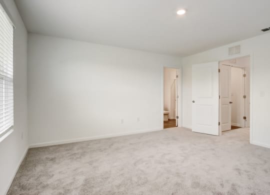 Spacious and empty master bedroom at Beacon at Arbours in Ruskin, FL
