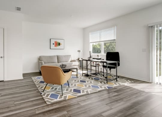 Stylishly decorated living room at Beacon at Arbours in Ruskin, FL