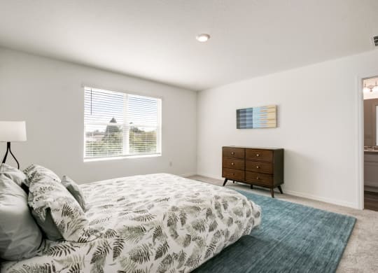 Sophisticated and fully furnished model master bedroom at Beacon at Arbours in Ruskin, FL
