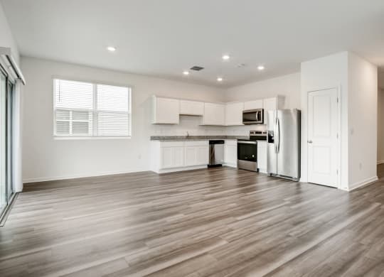 View from living room to kitchen at Beacon at Arbours in Ruskin, FL