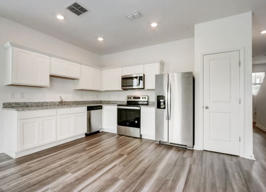 Modern and fully-equipped kitchen at Beacon at Arbours in Ruskin, FL