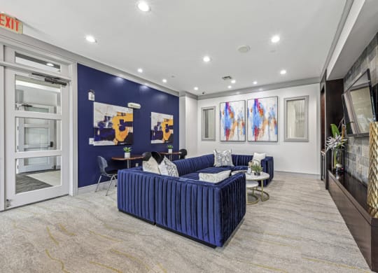 Modern resident lounge featuring a pool table and bar area at Allusion at West University apartments in Houston, TX