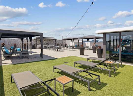 A sunny day at the outdoor seating area of a cafe.