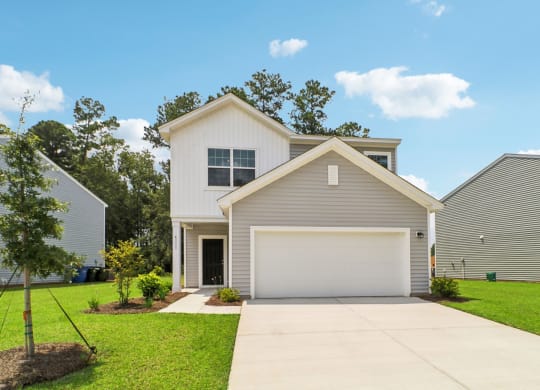 Maple Front view with a spacious driveway at Beacon at Ashley River Landing in Summerville, SC