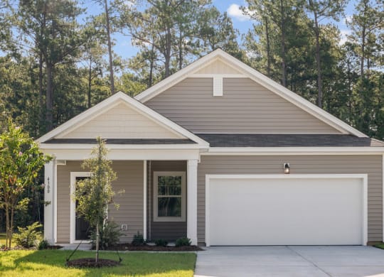 Front exterior of the Sequoia home painted in gray at Beacon at Ashley River Landing in Summerville, SC