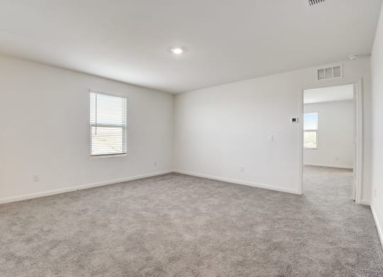a bedroom with white walls and carpet at Beacon at Meridian, San Antonio, TX 78245