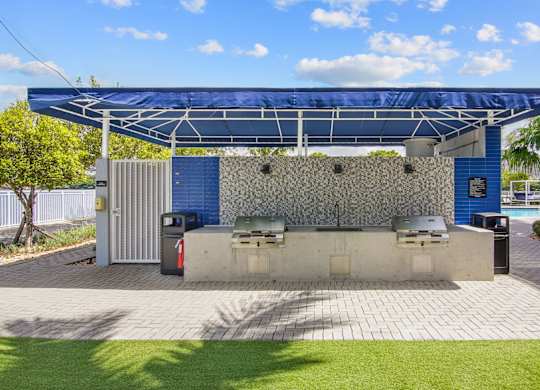 Grilling station with two BBQ grills at Blue Lagoon 7 in Miami, FL
