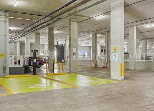 Property parking garage with EV charging stations at Blue Lagoon 7 in Miami, FL