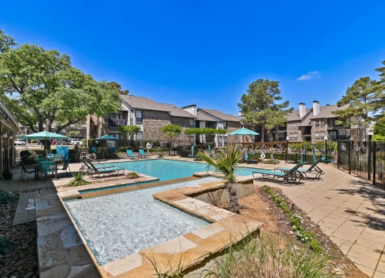 take a dip in the resort style pool at villas at houston levee west apartments