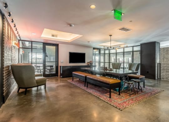 Large coworking space with big table at The Case Building in Dallas, TX