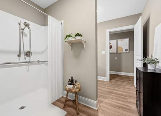 1 Bedroom Unit | Virtually Staged Handicap Bathroom at Capital Grand in Tallahassee, FL