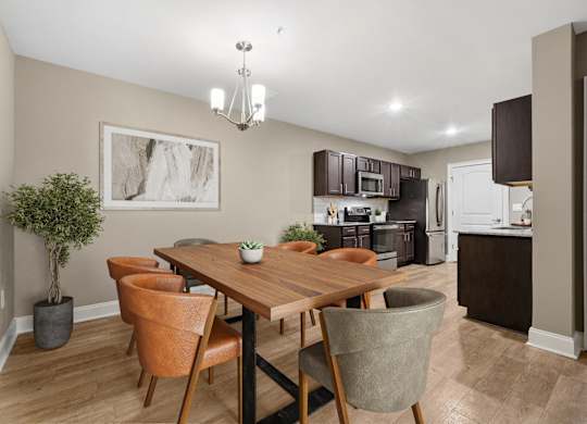 3 Bedroom Unit| Virtually Staged Dining Room at Capital Grand in Tallahassee, FL