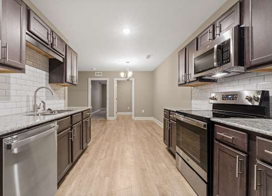 3 Bedroom Unit| Kitchen at Capital Grand in Tallahassee, FL