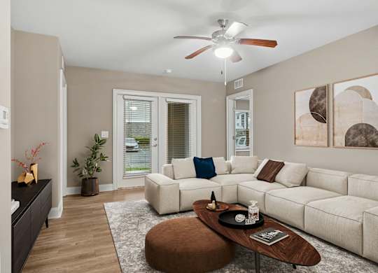 3 Bedroom Unit | Virtually Staged Living Room at Capital Grand in Tallahassee, FL