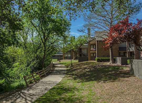 Chisholm Trail walking path beside our apartments at Chisholm Place Apartments in Plano, TX
