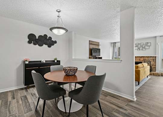 Model unit dining room at Chisholm Place in Plano, TX