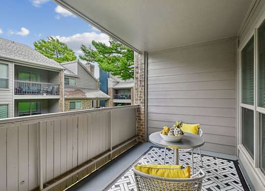 Model unit balcony at Chisholm Place in Plano, TX