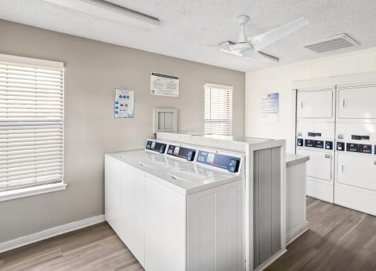 a laundry room with a washer and dryer