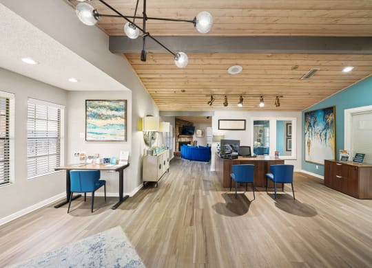 a resident clubhouse with hardwood flooring and wooden ceilings
