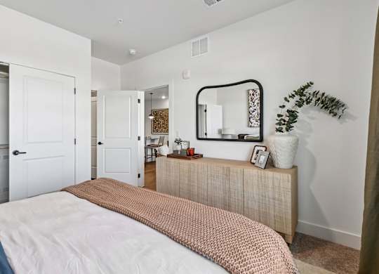 Model Unit bedroom in Chapel Park Apartments in Waco, TX
