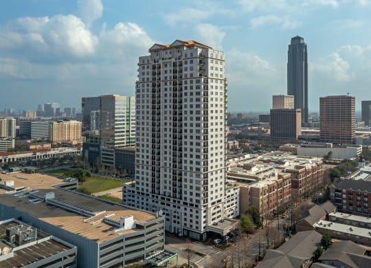 the view of apartment with skyscraper in the background at Dominion Post Oak in Houston, TX