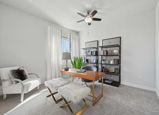Model apartment second bedroom used as an office space at Dominion Post Oak apartments in Houston, TX