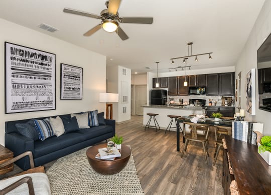 Model Living Room at  Dunedin Commons Apartment Homes in Dunedin, Florida, FL